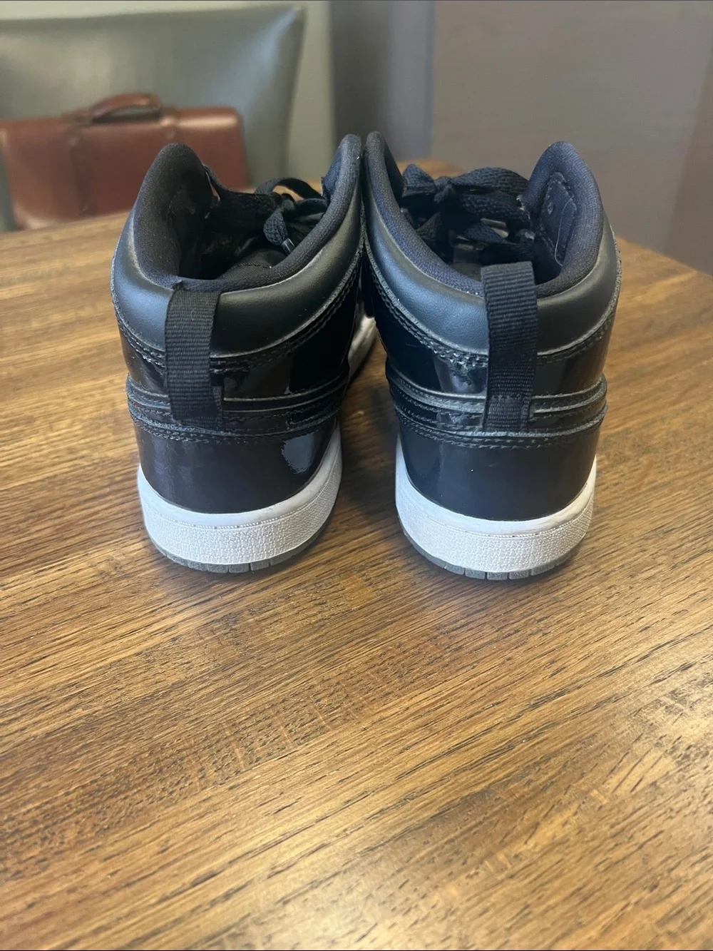 Black Nike High-Top Sneakers with White Sole - size 3